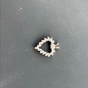 Elegant Gold and Silver Heart Pendant